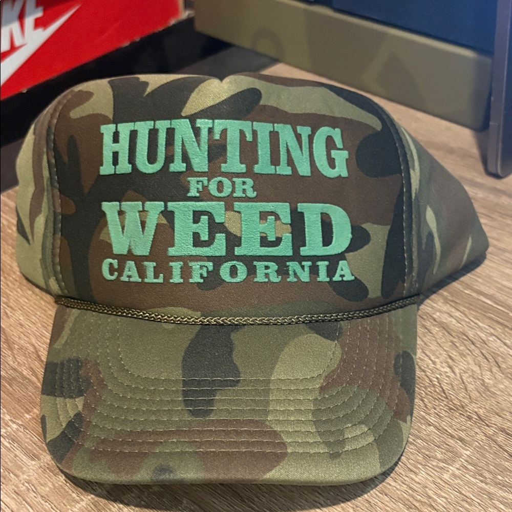 Camouflage Hunting Cap that reads Hunting for WEED in California